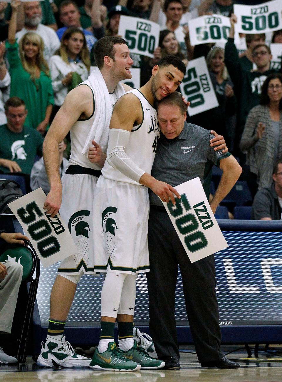 Senior guard Denzel Valentine made sure Tom Izzo got his 500th win, putting up a triple-double in Fullerton, Calif., then gave his coach a hug after the game as Matt Costello, left, looked on.