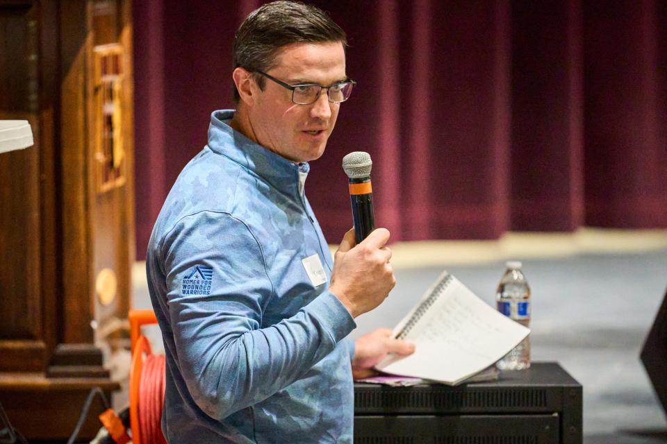 Owen Metz, a senior vice president at Dominium, responds to Chandler residents' questions during a town hall at Hamilton High School in Chandler on Jan. 25, 2023.