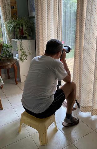 <p>Simu Liu X</p> Simu Liu's dad Zhenning Liu taking a photo,