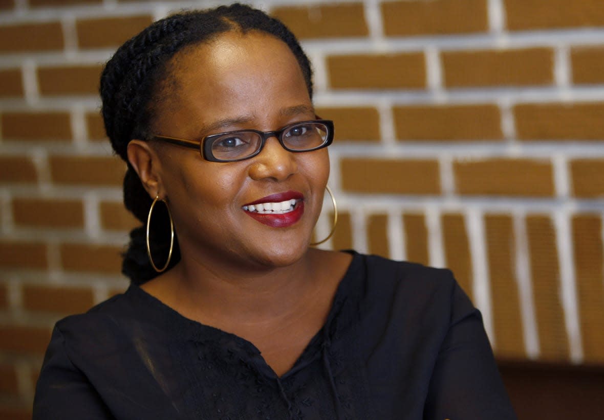 FILE- Haitian-American author Edwidge Danticat appears in the Little Haiti neighborhood of Miami on Oct. 18, 2010. Dandicat is this year’s winner of the PEN/Malamud Award for Excellence in the Short Story, a lifetime achievement honor named for the late Bernard Malamud. (AP Photo/Wilfredo Lee, File)