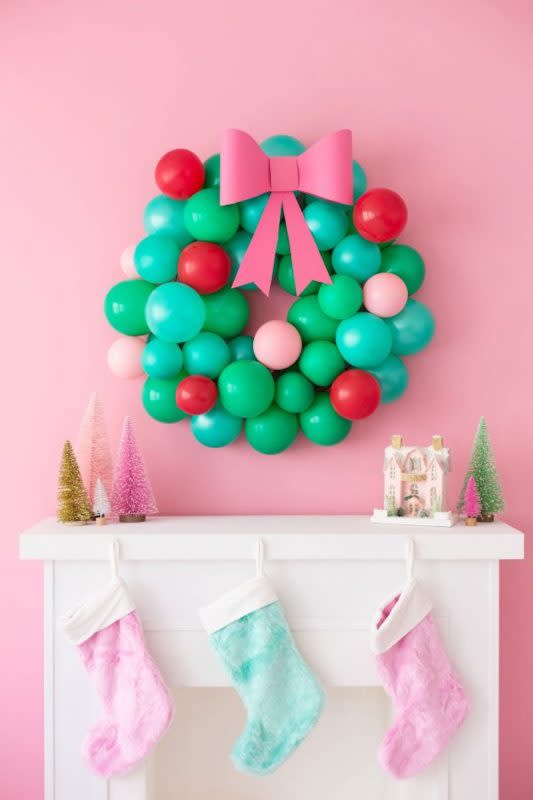 <p>Studio DIY</p><p>Kids will approve of this fun and playful decoration from <em><a href="https://studiodiy.com/diy-christmas-balloon-wreath//" rel="nofollow noopener" target="_blank" data-ylk="slk:Studio DIY;elm:context_link;itc:0;sec:content-canvas" class="link ">Studio DIY</a></em>. They’ll especially enjoy helping you blow up balloons for it.</p>