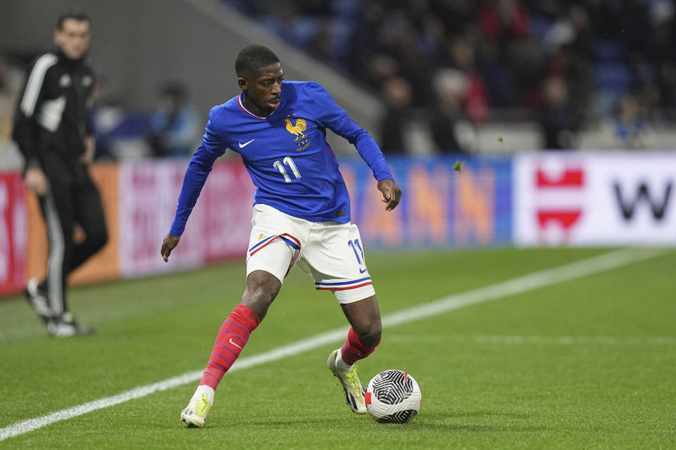 FILE - France's Ousmane Dembele in action during an international friendly soccer match between France and Germany at the Groupama stadium in Decines, near Lyon, central France, Saturday, March 23, 2024. (AP Photo/Laurent Cipriani, File)