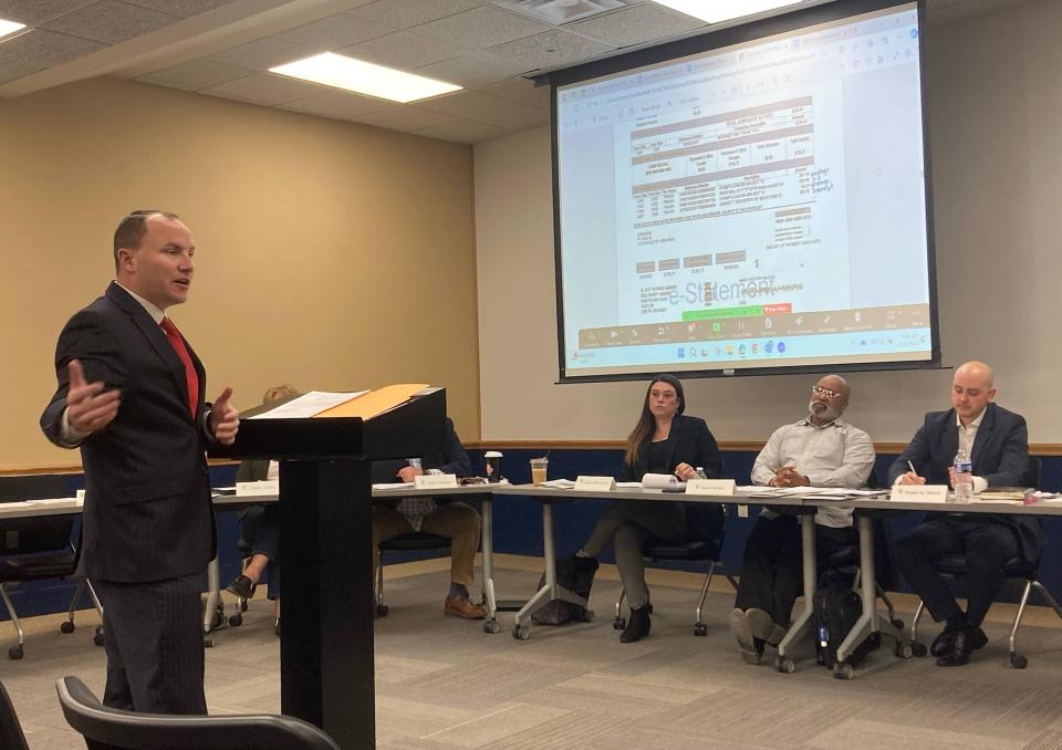 Erie County Executive Brenton Davis, on left, implores the Erie County Gaming Revenue Authority to improve its transparency during a meeting on Feb. 15, 2024. On right, are ECGRA board members Angela Amatangelo and Dale Barney and ECGRA Executive Director Perry Wood.