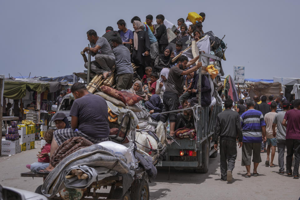 FILE - Palestinians fleeing from the southern Gaza city of Rafah during an Israeli ground and air offensive in the city on Tuesday, May 28, 2024. A single image, not even an authentic photograph, is the focus of a singular campaign on Instagram that has caught the attention of the algorithm and captured the imaginations of users across national borders — a show of support for the Palestinian movement as the war between Israel and Hamas enters its eighth month. (AP Photo/Abdel Kareem Hana, File)