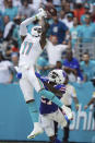 Buffalo Bills cornerback Tre'Davious White (27) defends Miami Dolphins wide receiver DeVante Parker (11) as he can't hold onto a pass in the endzone, during the first half of an NFL football game, Sunday, Sept. 19, 2021, in Miami Gardens, Fla. (AP Photo/Hans Deryk)