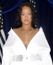 <p>Rihanna looked angelic in an all-white ensemble, “wet” hair, and glossy nude lips at the Madeworn x Roc96 pop-up event. (Photo by Jerritt Clark/Getty Images) </p>