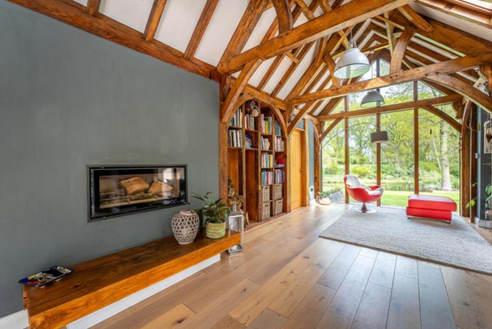 Gazette: The beams and wood floors give the home a warm feel
