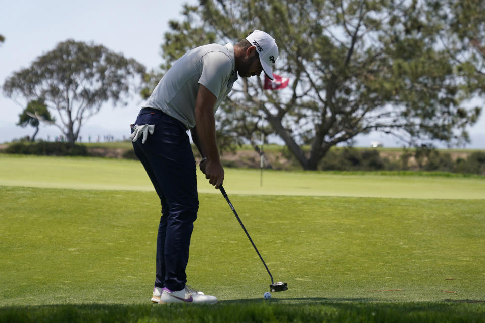 Matthew Wolff putts on the seventh green during the first round of the U.S. Open Golf Championship, Thursday, June 17, 2021, at Torrey Pines Golf Course in San Diego. (AP Photo/Gregory Bull)