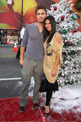 Eric Winter and Roselyn Sanchez at the Hollywood premiere of Warner Bros. Pictures' Fred Claus