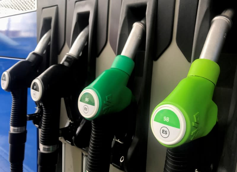 FILE PHOTO: Fuel nozzles at a Madrid petrol station