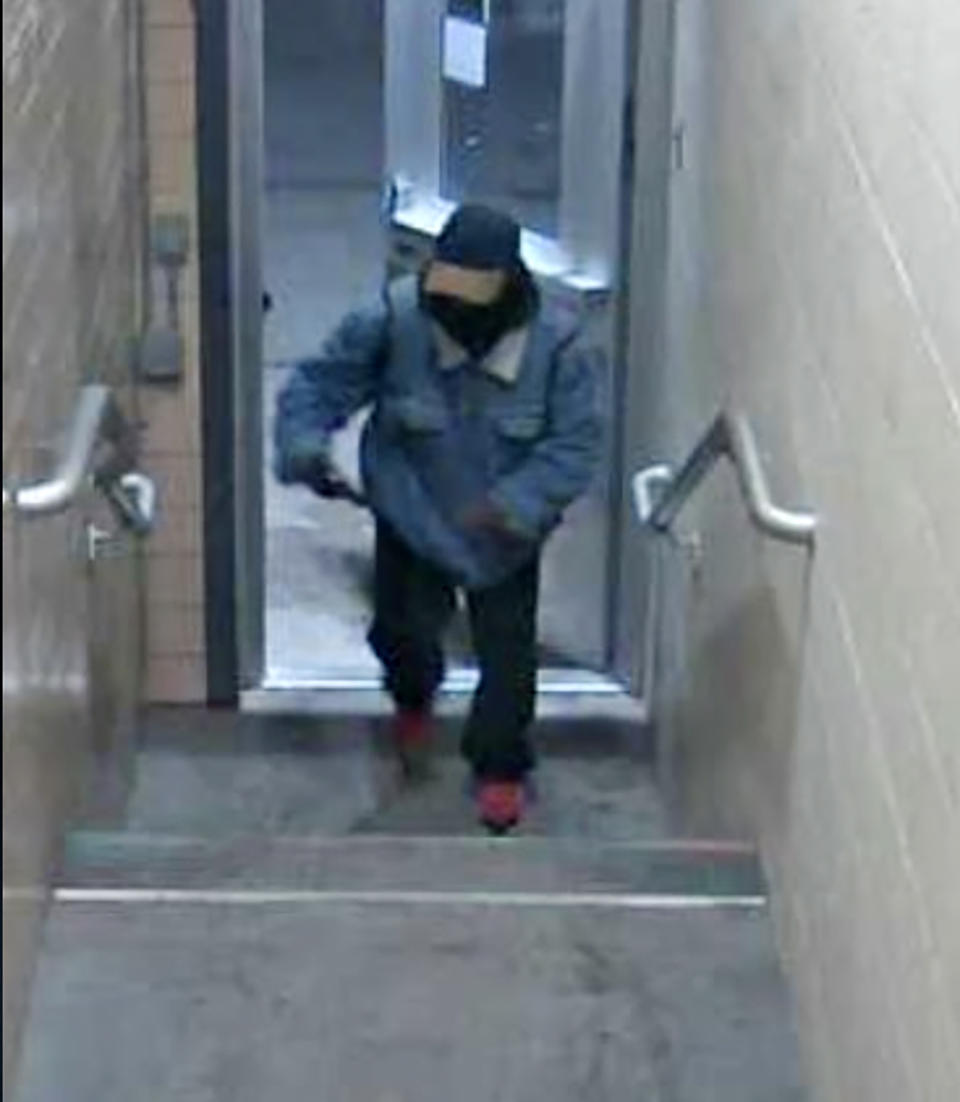 This image from surveillance video provided by Michigan State University Police and Public Safety shows a suspect whom authorities are looking for in connection with multiple shootings at the university late Monday, Feb. 13, 2023, in East Lansing, Mich. (Courtesy of MSU Police and Public Safety via AP)