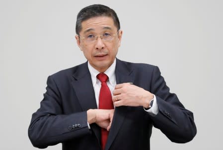 Nissan President and CEO Hiroto Saikawa attends a news conference at its global headquarters building in Yokohama