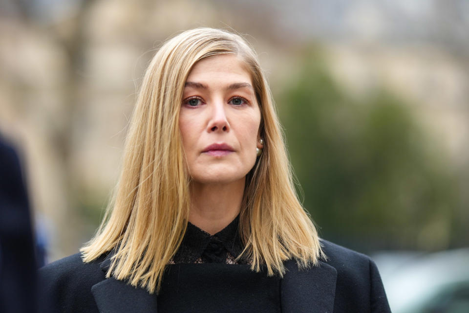 Close-up of Rosamund looking serious