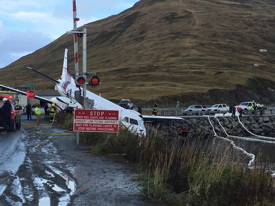 A commuter airplane carrying 42 people, including a high school swim team, went off the runway while landing at the airport in Unalaska, Alaska, Thursday, Oct. 17, 2019.