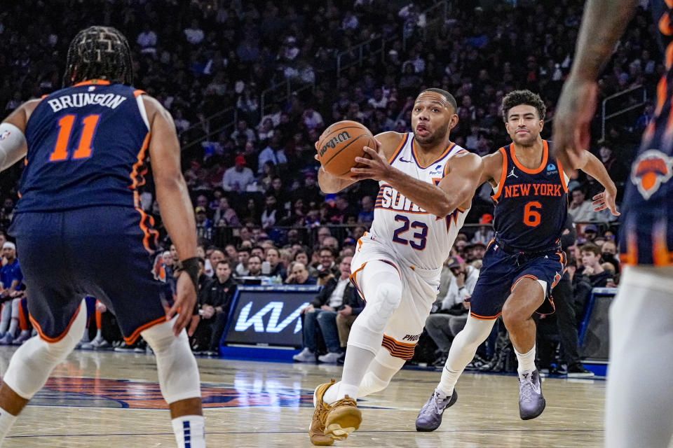 Phoenix Suns guard Eric Gordon (23) drives to the basket during the first half of an NBA basketball game against the Phoenix Suns in New York, Sunday, Nov. 26, 2023. (AP Photo/Peter K. Afriyie)