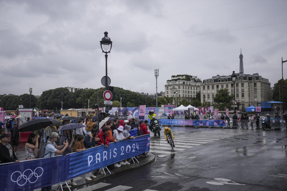 Grace Brown of Australia wins the Olympic time trial over the rainy