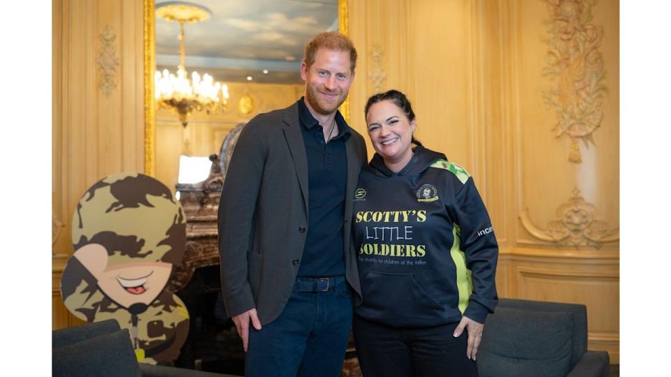 Prince Harry with Nikki Scott, Founder of Scotty's Little Soldiers