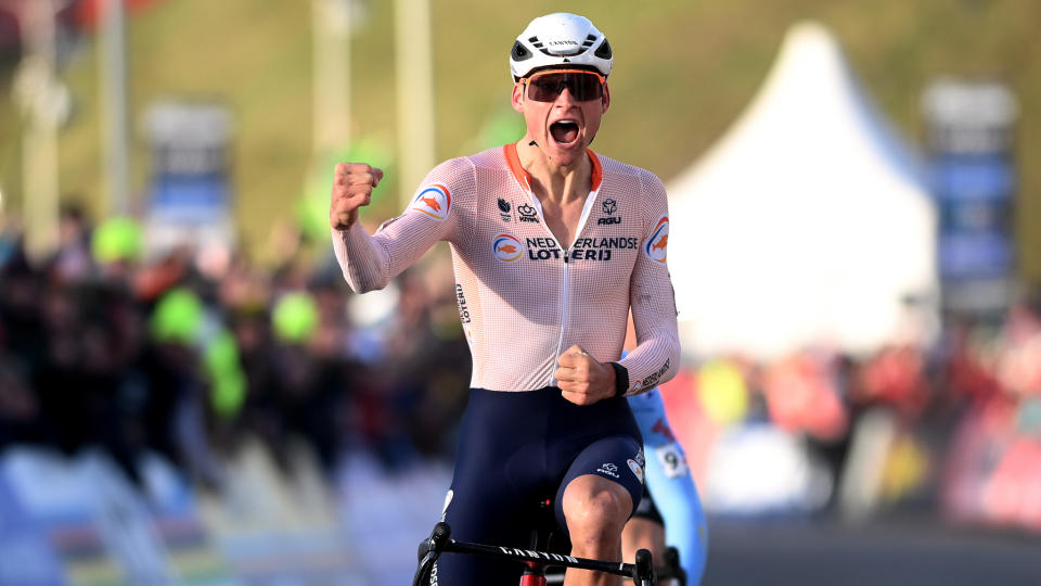  Mathieu van der Poel punches the air as he wins the cyclocross world championships. 