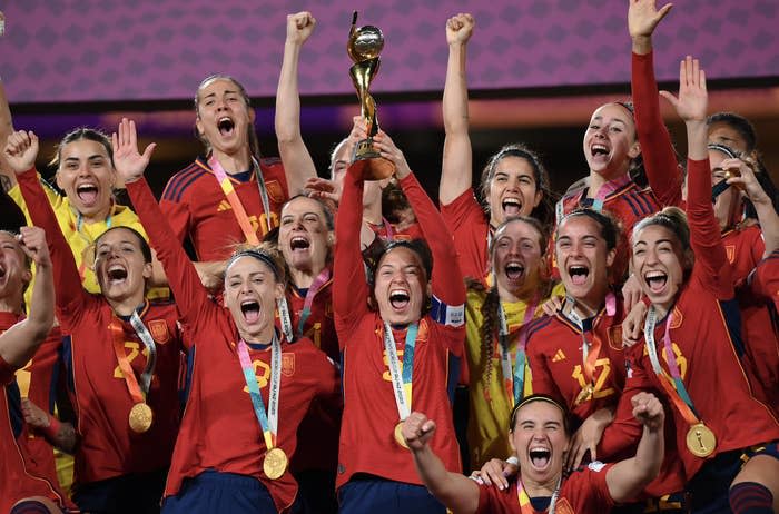 The Spanish national team celebrate with the Women's World Cup trophy