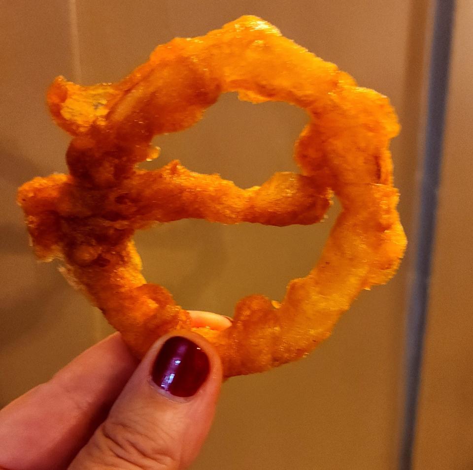 This onion ring was served in my order at the Prince's Head Pub, the setting for the Crown & Anchor in "Ted Lasso," the show set in Richmond in the U.K. You can't miss that it looks just like the roundel that signals the London tube stops.