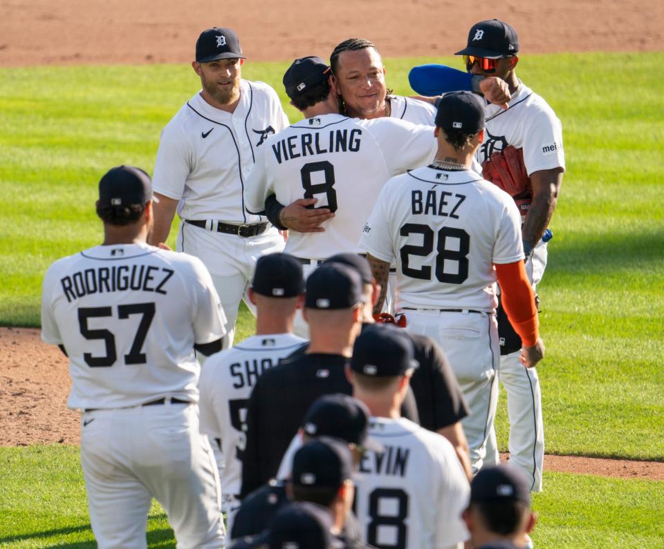 Teammates lineup to hug Miguel Cabrera as he leaves the field for the final time as a Detroit Tigers on Detroit, Sunday, Oct. 1, 2023.