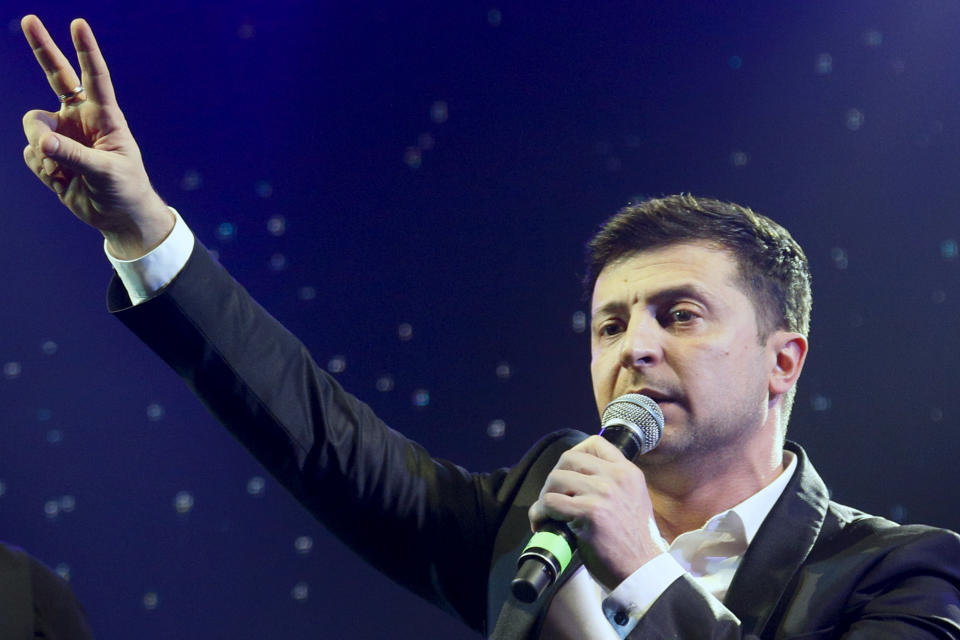 FILE In this file photo taken on Friday, March 29, 2019, Ukrainian comedian Volodymyr Zelenskiy hosts a comedy show at a concert hall in Brovary, Ukraine. Zelenskiy has no political experience but seems to have won Sunday's presidential vote, putting him in a strong position for the runoff election in three weeks’ time. (AP Photo/Efrem Lukatsky, File)