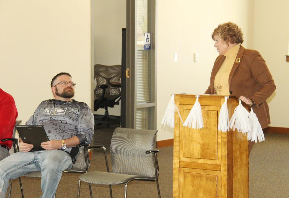 Judge Jennifer Bauknecht speaks to Charles Phinney during his drug court graduation ceremony Friday, March 31. Phinney is the first drug court graduate in two years.