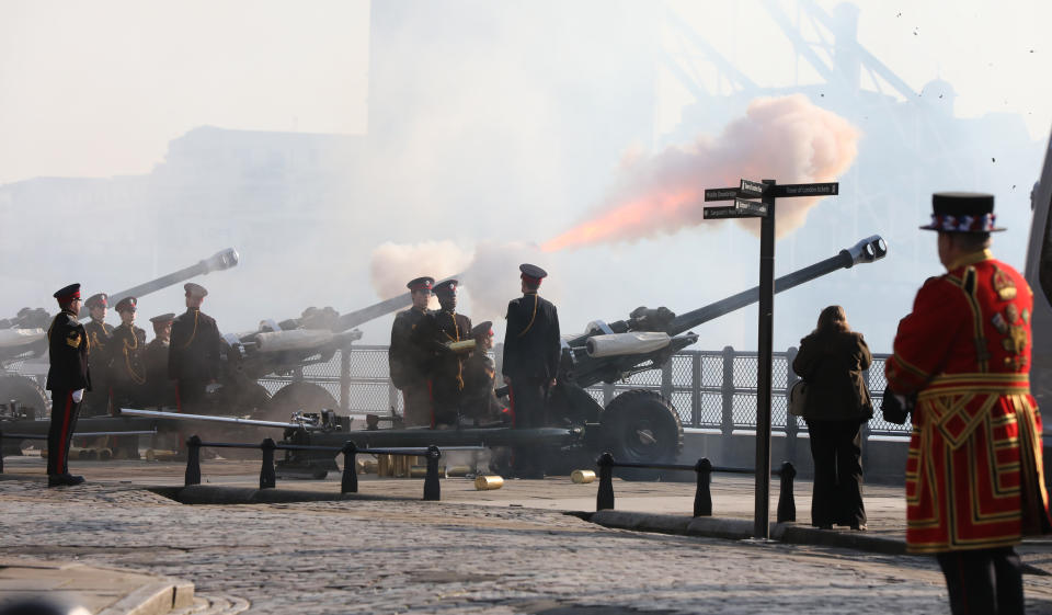 Members of the Honourable Artillery Company (HAC) fire a 62-round gun salute from the wharf at the Tower of London, to mark the 68th anniversary of the accession of Queen Elizabeth II to the throne in 1952. (Photo by Luciana Guerra/PA Images via Getty Images)