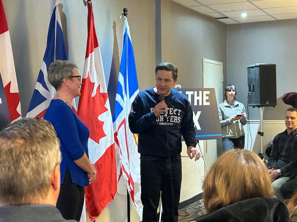 Federal Conservative Leader Pierre Poilievre spoke to a crowd of about 150 people at a rally in Corner Brook on Thursday night. He stands next to Carol Anstey, who will run for the party in the next federal election in the district of Long Range Mountains.