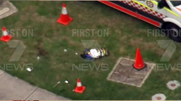 What appears to be blood on the grass outside West Hoxton Hungry Jack's. Photo: 7News