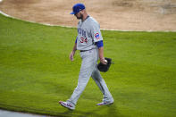 Chicago Cubs starting pitcher Jon Lester heads to the dugout after being pulled by manager David Ross during the fourth inning of the team's baseball game against the Chicago White Sox in Chicago, Saturday, Sept. 26, 2020. (AP Photo/Nam Y. Huh)