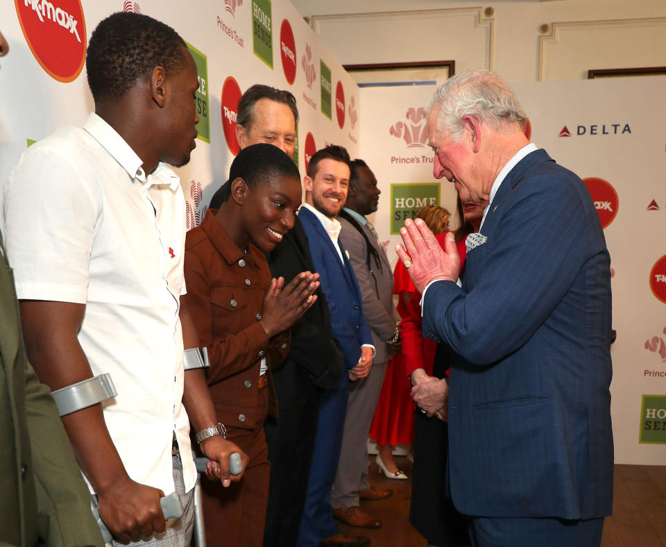 Charles greets Michaela Coel (centre) as he attends the Prince's Trust And TK Maxx &amp; Homesense Awards at London Palladium on March 11.&nbsp; (Photo: WPA Pool via Getty Images)