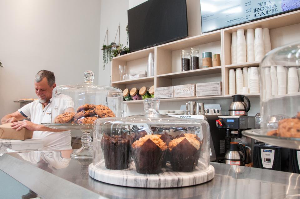 Chef Cyrille Regottaz prepares a customer's order at the new Via Roma Café in Palm Beach.