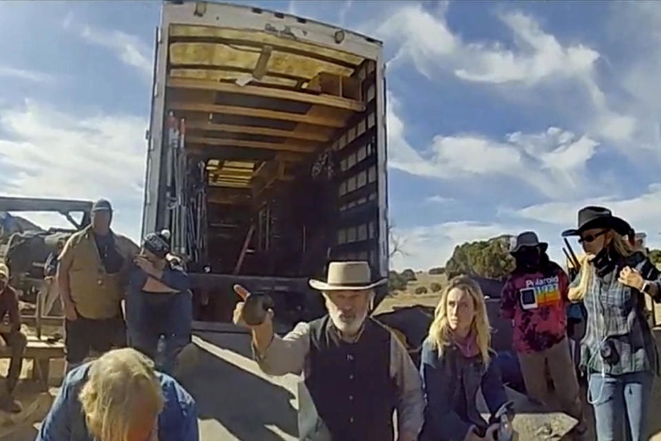 In this image taken from video released by the Santa Fe County Sheriff's Office, Alec Baldwin gestures while talking with investigators following a fatal shooting on a movie set in Santa Fe, New Mexico in 2021. (Santa Fe County Sheriff's Office via AP, File)