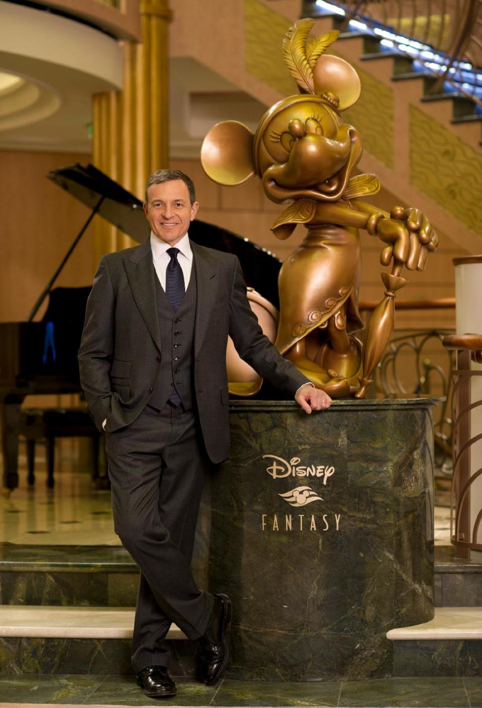 In this photo provided by the Walt Disney Company, Disney President and CEO Robert A. Iger poses for photos aboard the newest ship of Disney Cruise Line, the Disney Fantasy, at a star-studded christening gala held Thursday, March 1, 2012 in New York. The 4,000-passenger, 14-deck ship with its distinctive mouse ears logo arrived in New York Tuesday after traveling nearly 3,800 miles across the Atlantic Ocean from the shipyards where it was built in Bremerhaven, Germany. The ship will sail on seven-night Caribbean cruises starting March 31 from Port Canaveral, Fla. (AP Photo/Disney, Kent Phillips)