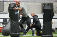 Defensive lineman Jaime Humberto Jiron Bowles, of Panama, takes part in the NFL International Combine at the Tottenham Hotspur Stadium in London, Tuesday, Oct. 4, 2022. International athletes on Tuesday are taking part in a series of tests in front of NFL evaluators for a potential position in the NFL's International Player Pathway programme. (AP Photo/Kin Cheung)