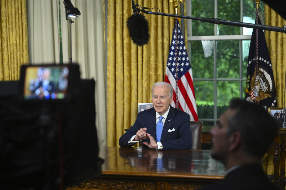 President Joe Biden addresses the nation on the budget deal that lifts the federal debt limit and averts a U.S. government default, from the Oval Office of the White House in Washington, Friday, June 2, 2023. (Jim Watson/Pool via AP)