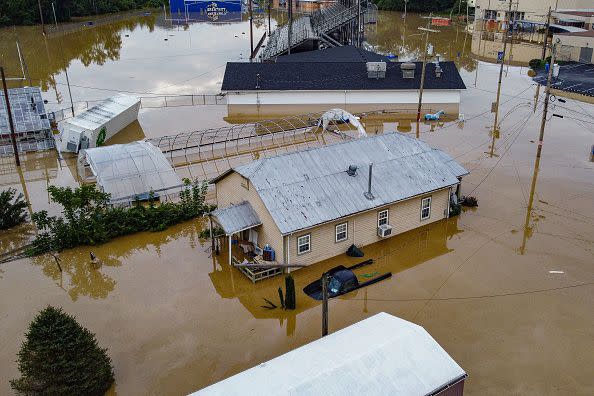 Aerial view of homes submerged under flood waters from the North Fork of the Kentucky River in Jackson, Kentucky, on July 28, 2022.