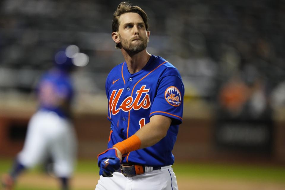 New York Mets' Jeff McNeil reacts after hitting a flyout during the eighth inning of a baseball game against the Washington Nationals, Saturday, July 29, 2023, in New York. (AP Photo/Frank Franklin II)