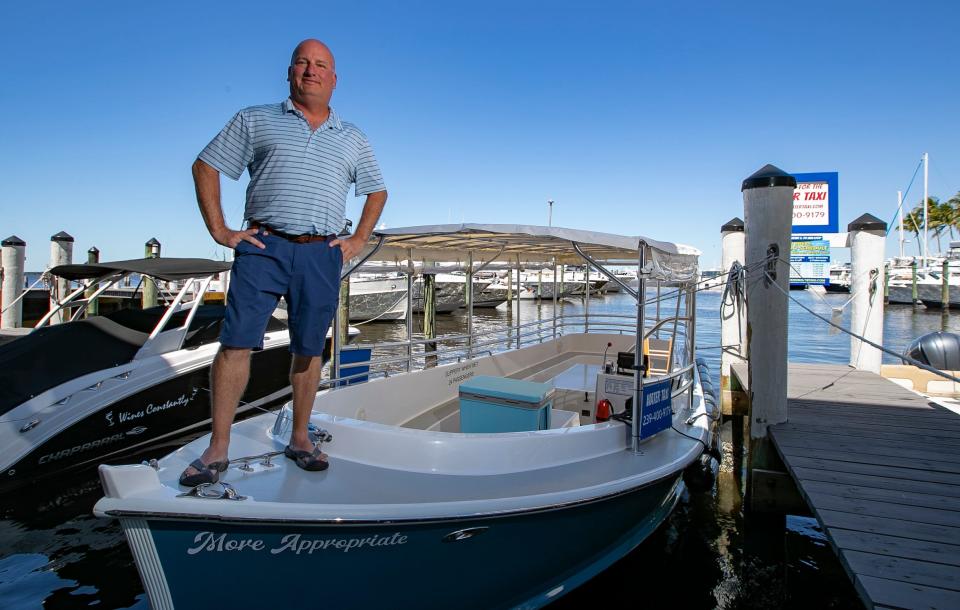 Brian Corrion, the former owner of Laugh Inn Comedy Cafe, stands aboard his boat "More Appropriate." Corrion has launched Fort Myers Water Taxi, a boat service that visits downtown Fort Myers and three other nearby stops.