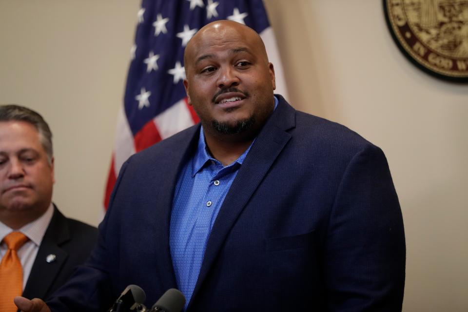 Former FSU football player Corey Simon speaks at a news conference where Gov. Ron DeSantis announced that he supports a bill to allow college athletes to profit from their likeness at the Capital Thursday, Oct. 24, 2019. 