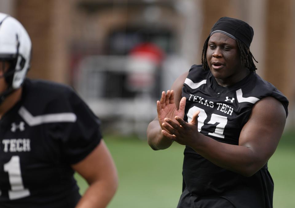 Texas Tech defensive tackle Tony Bradford, right, is a fifth-year senior with 35 career starts. This season, he's been credited with 29 tackles, including four tackles for loss and three sacks.