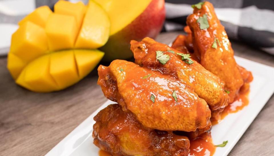 The spicy mango wings at Chex Grill & Wings.