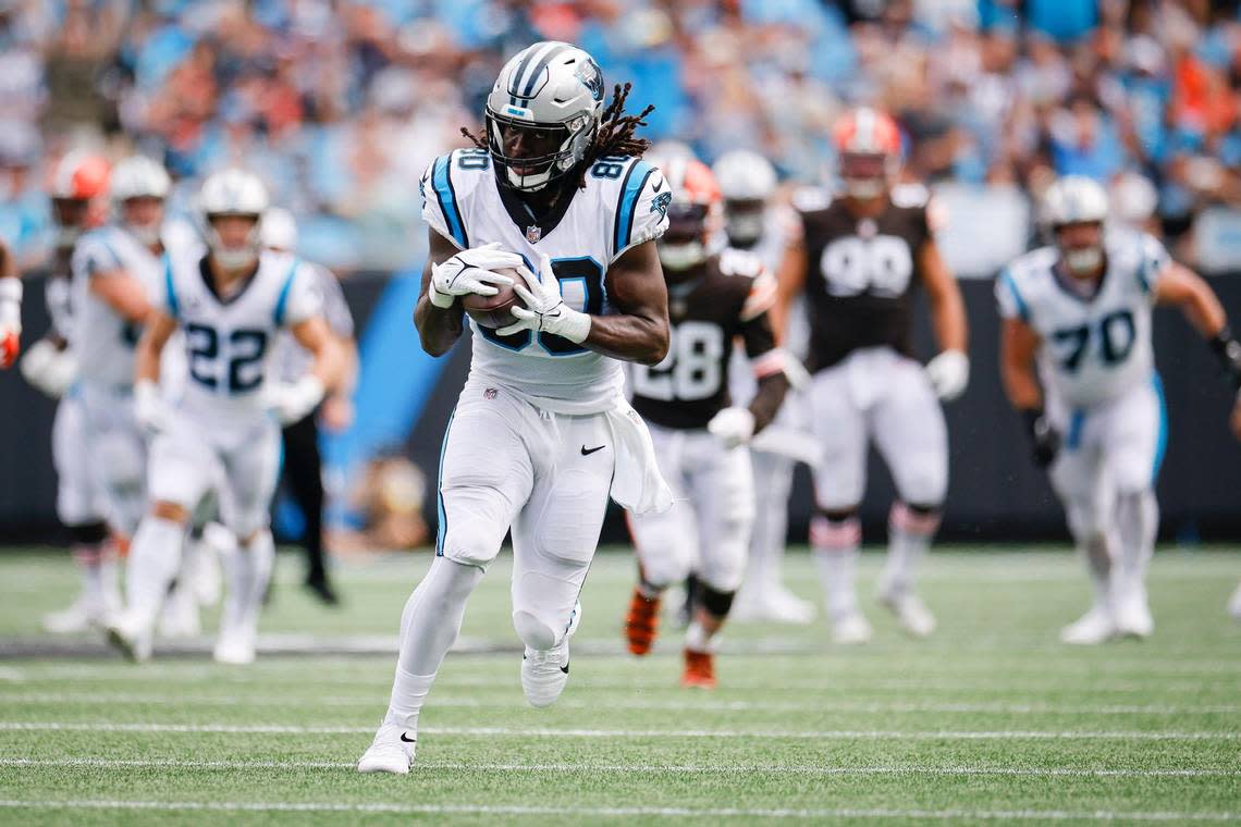 Carolina Panthers tight end Ian Thomas (80) runs the ball down field over Cleveland Browns defense during a game at Bank of America Stadium in Charlotte, N.C., Sunday, Sept. 11, 2022.