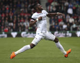 Crystal Palace's Wilfried Zaha celebrates scoring his side's second goal of the game during the English Premier League soccer match between AFC Bournemouth and Crystal Palace at the Vitality Stadium, Bournemouth, England. Saturday, April 7, 2018. (Adam Davy/PA via AP)