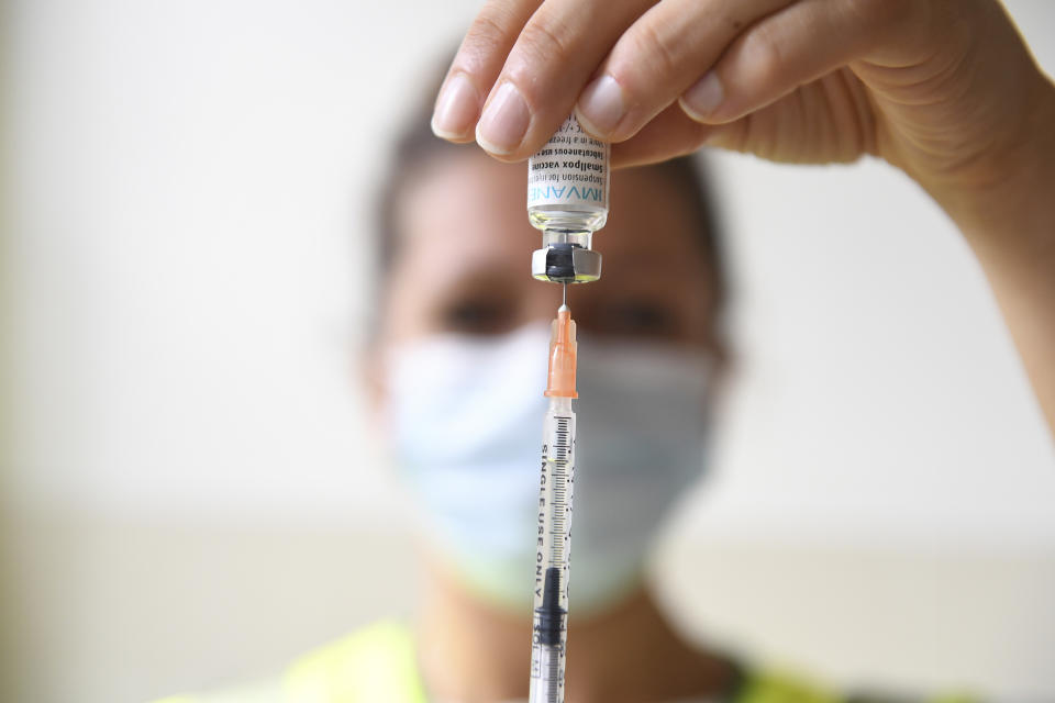 FILE - A health professional prepares a dose of a Monkeypox vaccine at the Edison municipal vaccination centre in Paris Wednesday July 27, 2022. Public health officials warn that moves by rich countries to buy large quantities of monkeypox vaccine, while declining to share doses with Africa, could leave millions of people unprotected against a more dangerous version of the disease and risk continued spillovers of the virus into humans. (Alain Jocard, Pool via AP, FIle)