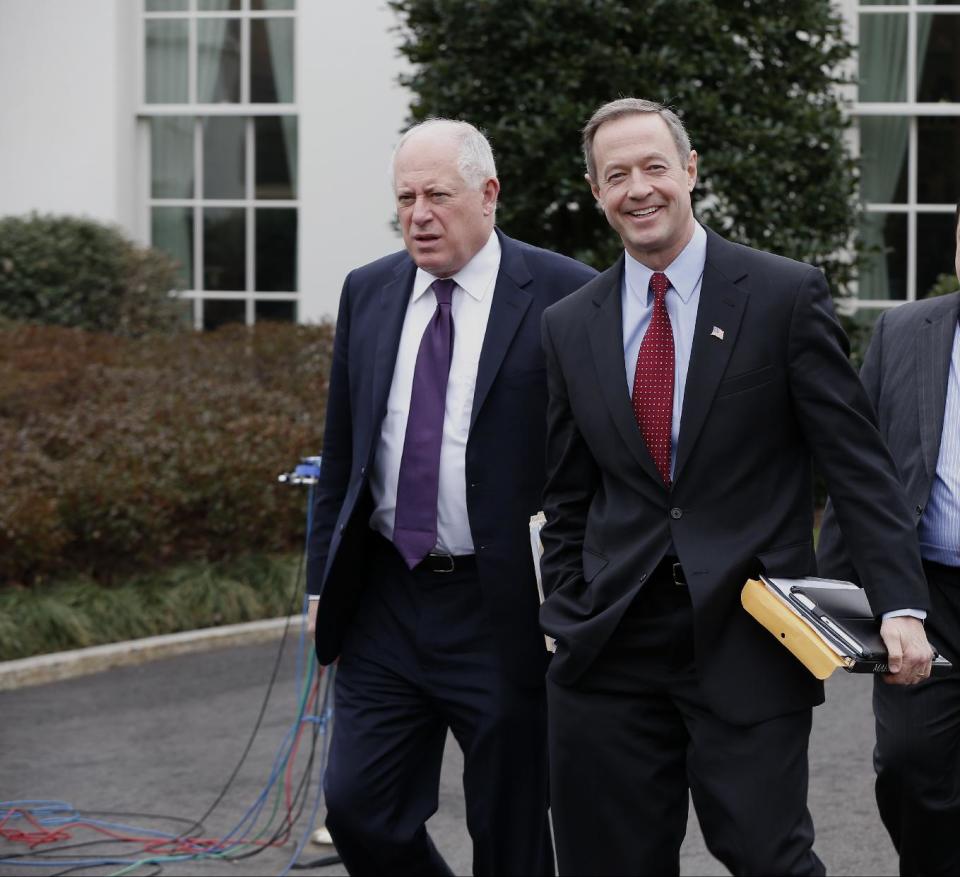 Maryland Gov. Martin O'Malley, right, and Illinois Gov. Pat Quinn walk outside the White House in Washington, Friday, Feb. 21, 2014, before their meeting with President Barack Obama. (AP Photo/Charles Dharapak)