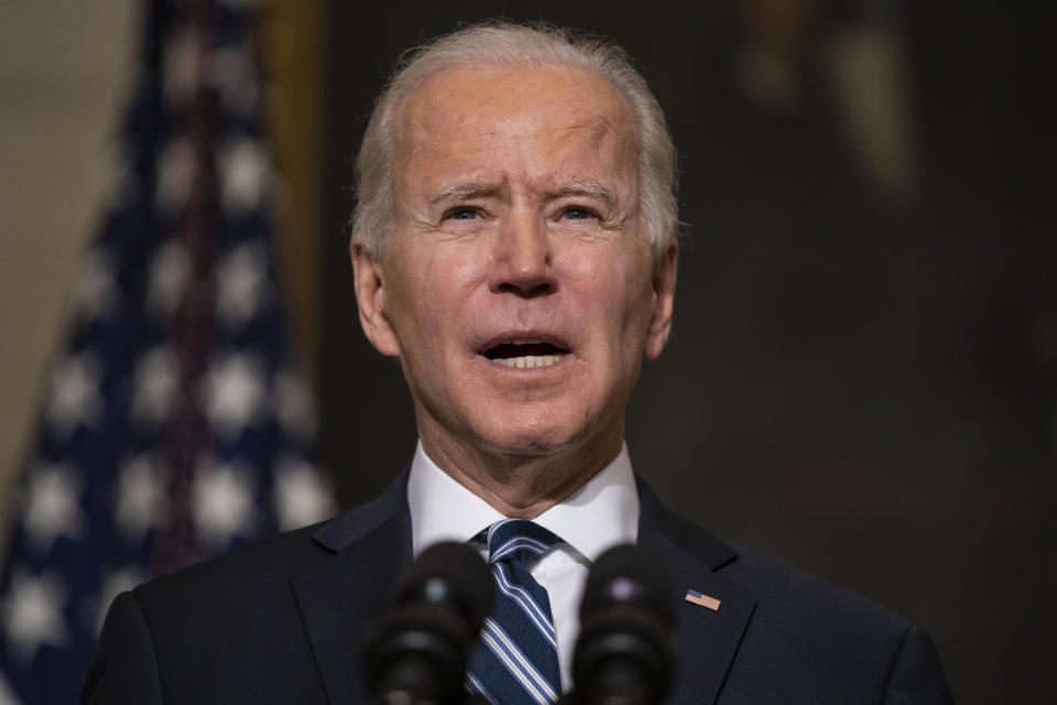 In this Jan. 27, 2021, photo, President Joe Biden speaks in the State Dining Room of the White House in Washington. Biden’s $1.9 trillion COVID-19 relief package presents a first political test. More than a sweeping rescue plan, it's a test of the strength of his new administration, of Democratic control of Congress and of the role of Republicans in a post-Trump political landscape. (AP Photo/Evan Vucci)