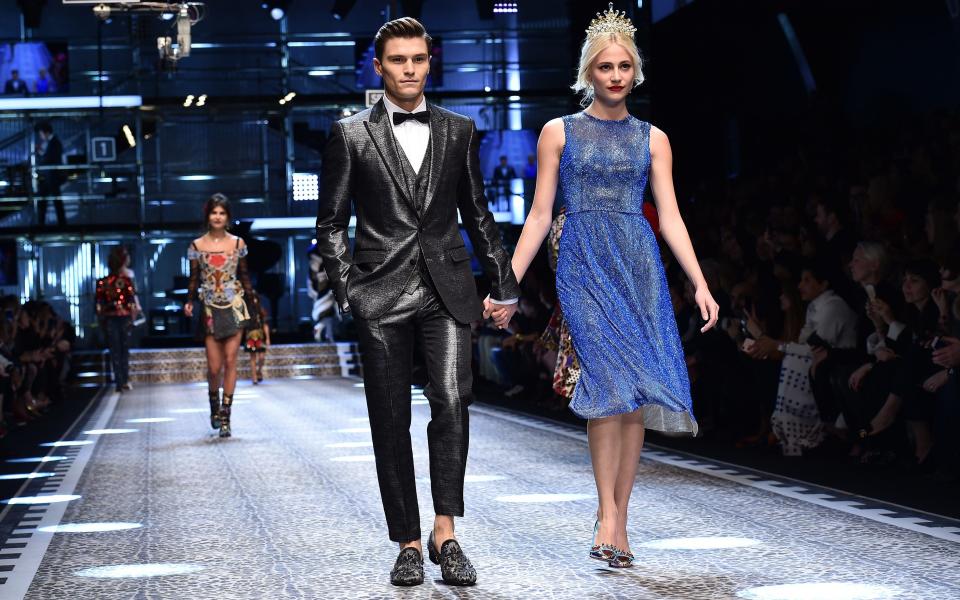 Oliver Cheshire and Pixie Lott walk the runway in Milan - Credit: Getty