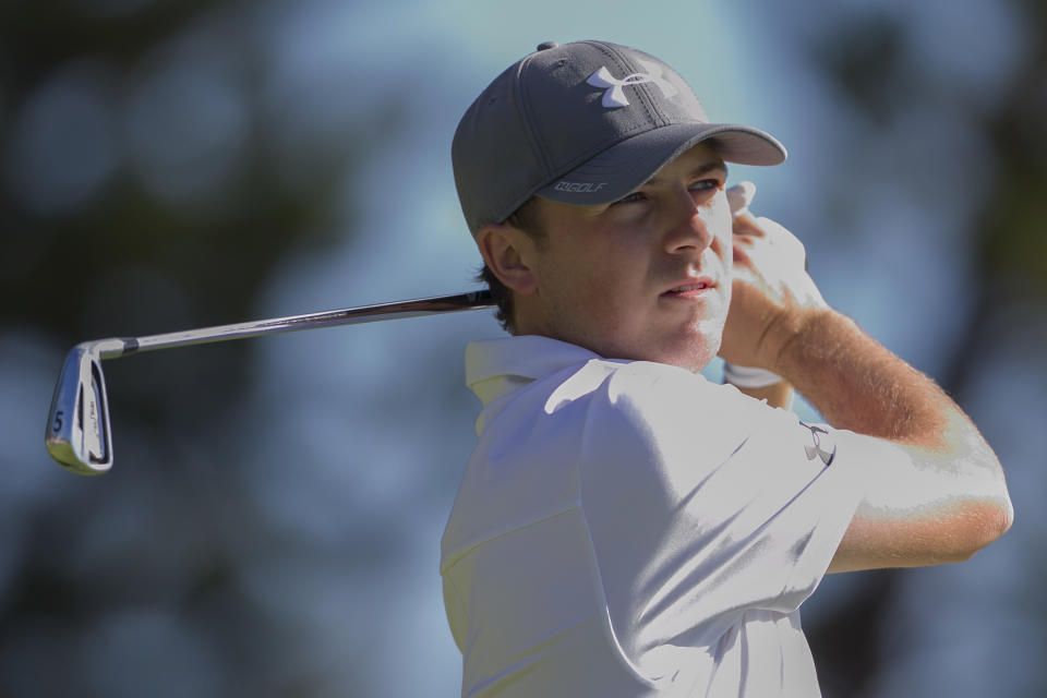 Jordan Spieth follows his drive off the second tee during the final round of the Tournament of Champions golf tournament, Monday, Jan. 6, 2014, in Kapalua, Hawaii. (AP Photo/Marco Garcia)